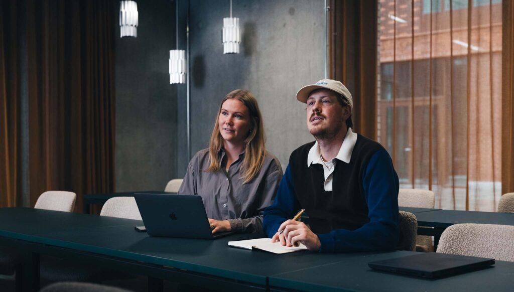 Coworkers listening to a presentation
