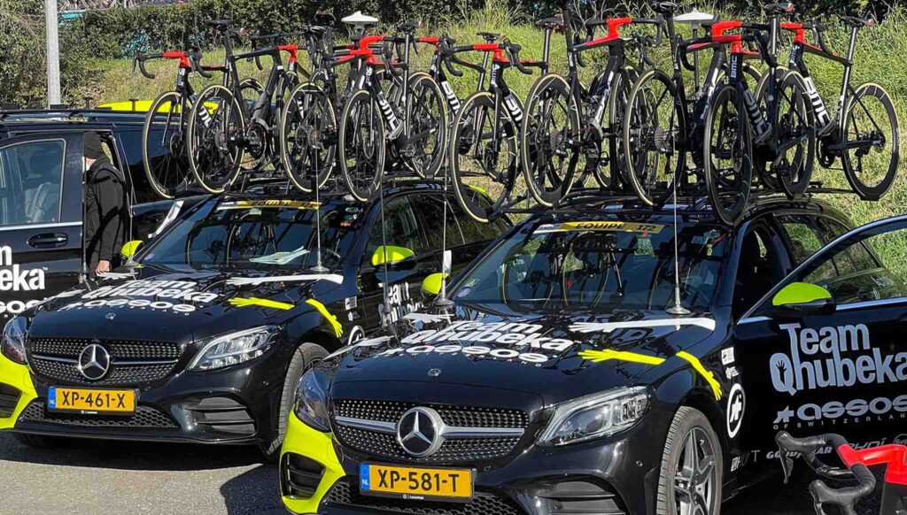 Team Qhuebeka cars with bikes
