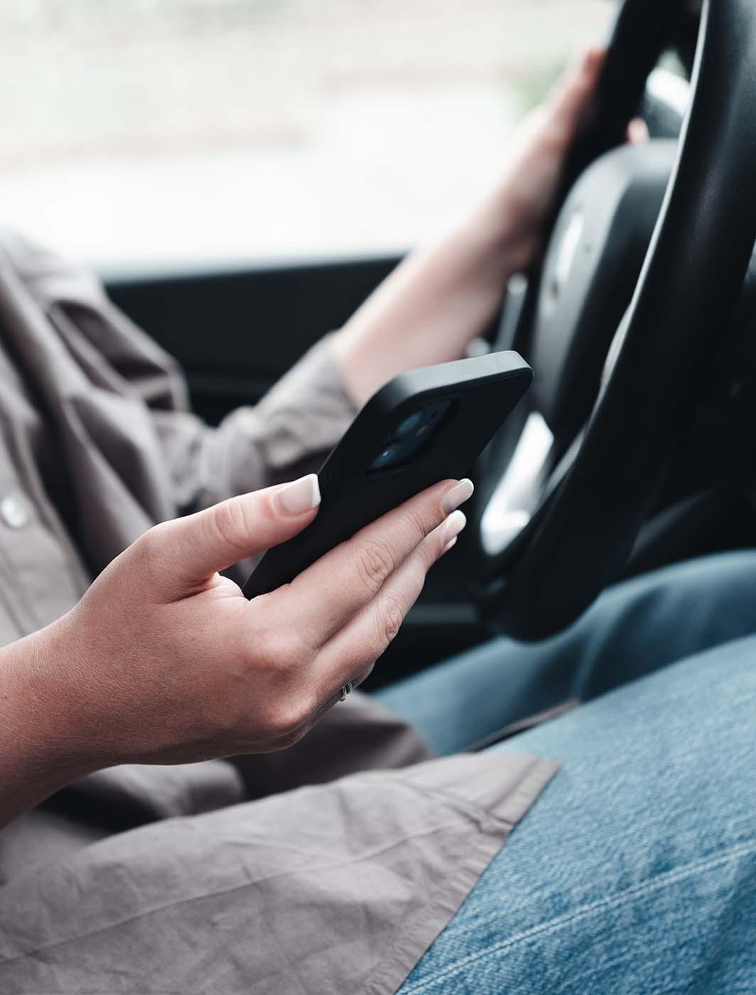 mileage log with phone in car